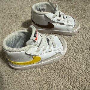 Nike Kids White Sneakers with Yellow and Brown Accents